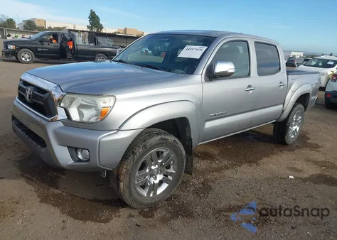 2014 Toyota Tacoma Base V6 z USA, uszkodzony, nr VIN 3TMLU4EN9EM143255